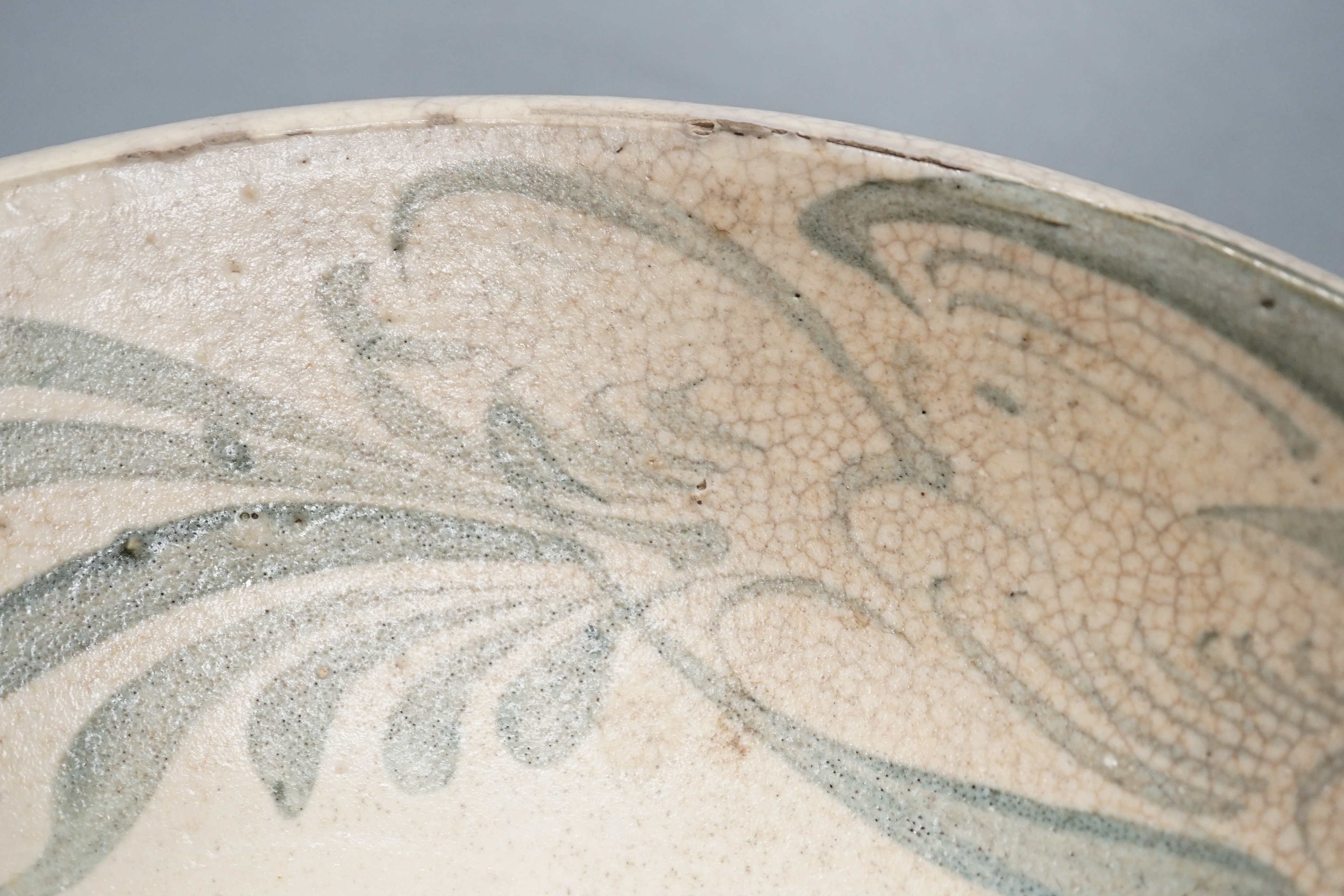 A Chinese provincial blue and white ‘kitchen Qing’ dish 32.5cm diameter